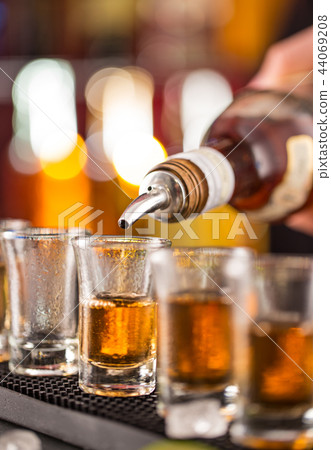 Snifters on a bar desk. 44069208