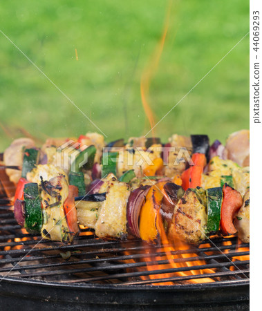 Barbecue grill with tasty skewers, close-up. 44069293