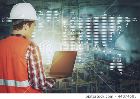Man holding laptop withdigital worldmap connection Man holding laptop withdigital worldmap connection 44074593