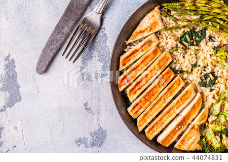 Grilled chicken breast with brown rice Grilled chicken breast with brown rice 44074831