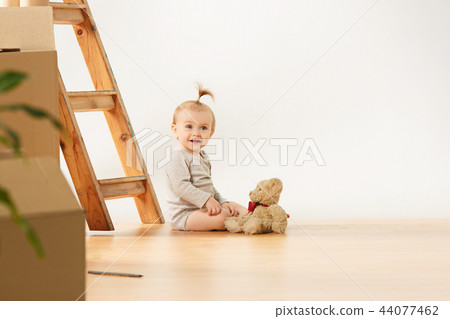 Couple moving to a new home - Happy married people buy a new apartment to start new life together Couple moving to a new home - Happy married people buy a new apartment to start new life together 44077462