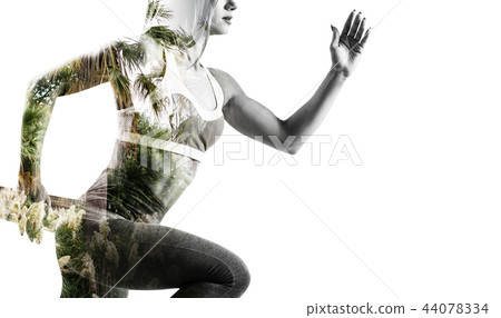 Double exposure of young sporty woman and nature. Double exposure of young sporty woman and nature. 44078334