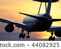 Sunset and airplane 44082925