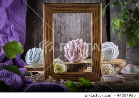 Still life with zephyr  with a wooden frame 44084980