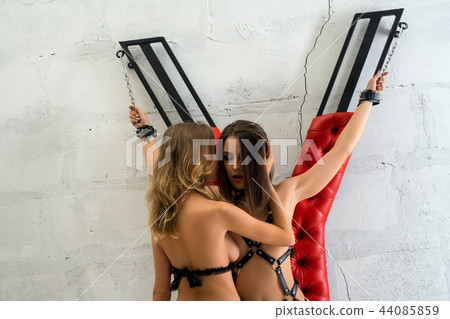 Two girls perfoming erotic play cropped shot 44085859