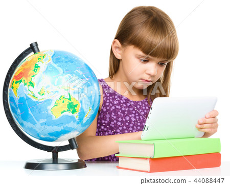 Young girl is using tablet 44088447