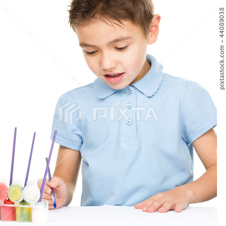 Boy is playing with paints Boy is playing with paints 44089038