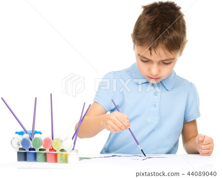 Boy is playing with paints Boy is playing with paints 44089040