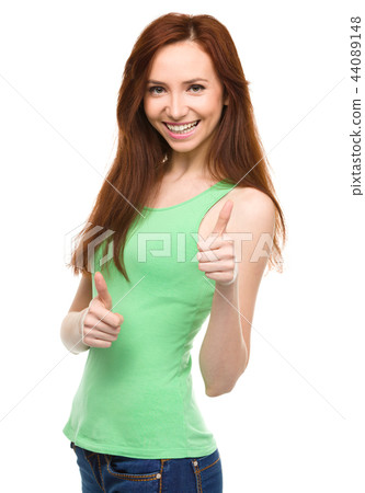 Woman is showing thumb up gesture Woman is showing thumb up gesture 44089148