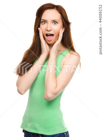 Portrait of a young surprised woman Portrait of a young surprised woman 44089152