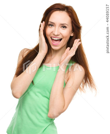 Portrait of a young surprised woman Portrait of a young surprised woman 44089157