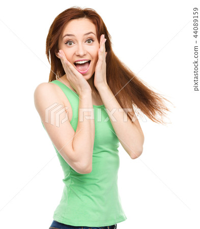 Portrait of a young surprised woman Portrait of a young surprised woman 44089159