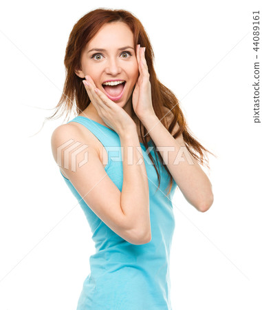 Portrait of a young surprised woman Portrait of a young surprised woman 44089161