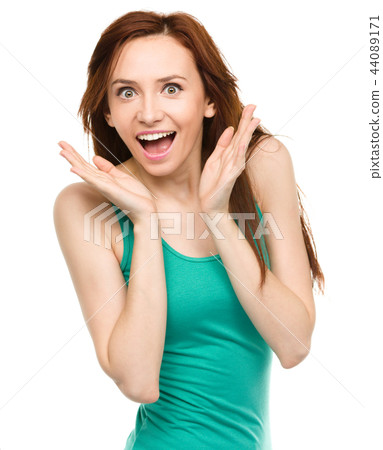 Portrait of a young surprised woman Portrait of a young surprised woman 44089171