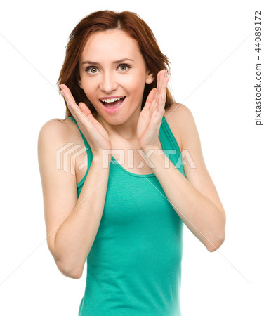 Portrait of a young surprised woman Portrait of a young surprised woman 44089172