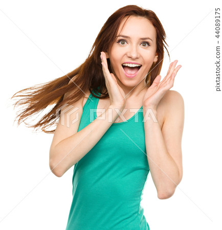 Portrait of a young surprised woman 44089175