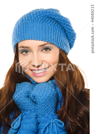 Young happy woman wearing winter cloth Young happy woman wearing winter cloth 44089215