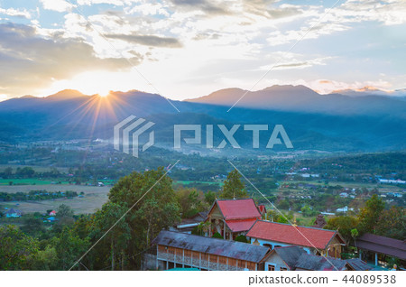 Sunset landscape with mountain village Sunset landscape with mountain village 44089538