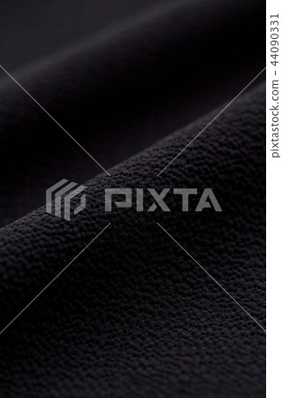 Close up of black crested material Close up of black crested material 44090331