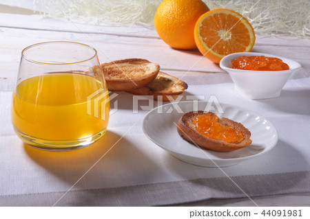 Morning Breakfast with orange jam on bread toast Morning Breakfast with orange jam on bread toast 44091981