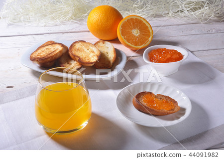 Morning Breakfast with orange jam on bread toast Morning Breakfast with orange jam on bread toast 44091982