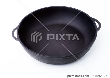 A new, clean and empty cast-iron pan for the grill A new, clean and empty cast-iron pan for the grill 44092124