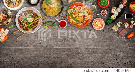 Various of asian meals on rustic background , top view , place for text. Various of asian meals on rustic background , top view , place for text. 44094695