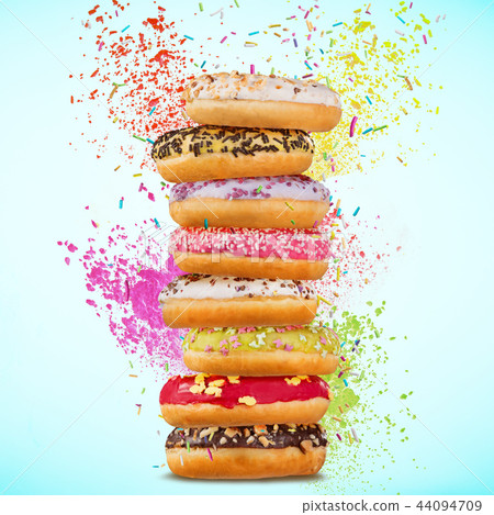 Tasty doughnuts on pastel blue background. 44094709
