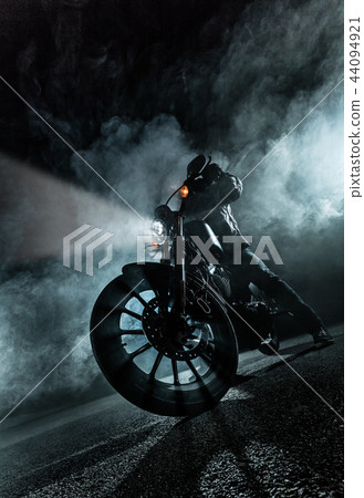 High power motorcycle chopper at night. High power motorcycle chopper at night. 44094921