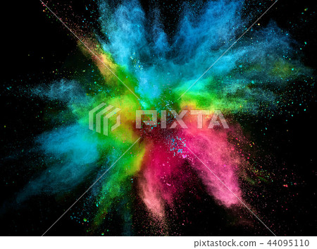 Colored powder explosion on black background. Colored powder explosion on black background. 44095110