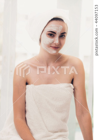 Beautiful woman having a facial treatment at spa. Beautiful woman having a facial treatment at spa. 44097153