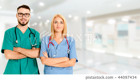 Doctors working with colleague in the hospital. 44097434