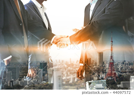 Double exposure Business People Handshake Meeting Double exposure Business People Handshake Meeting 44097572