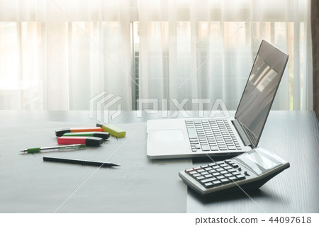 accountant tools with calculator and laptop accountant tools with calculator and laptop 44097618