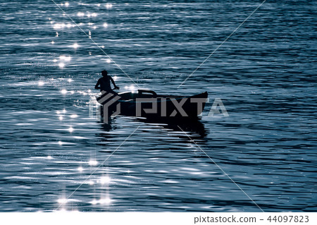 Small boat on the lake  44097823