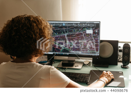 Architect drawing with cad software designing building Architect drawing with cad software designing building 44098676