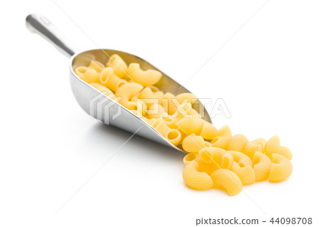 Uncooked elbow macaroni. 44098708