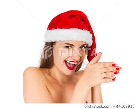 Pretty woman in santa hat, isolated Pretty woman in santa hat, isolated 44102933