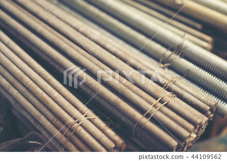 Stack of steel pipes in metal factory shop Stack of steel pipes in metal factory shop 44109562