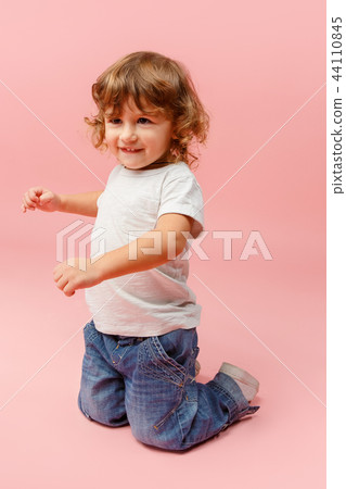 Portrait of happy joyful beautiful little boy, studio shot Portrait of happy joyful beautiful little boy, studio shot 44110845