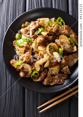 Dak-ttongjip is a Korean dish made by stir-frying 44114215
