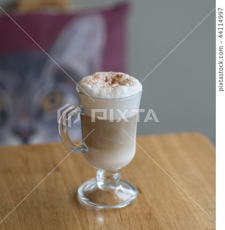 coffee latte with cinnamon at cafe place wooden  44114997
