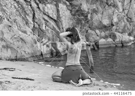 young naked Amazon woman on the sand river beach 44116475