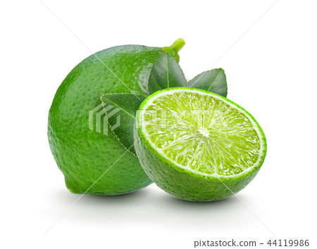 图库照片: fresh lime with leaf on white background