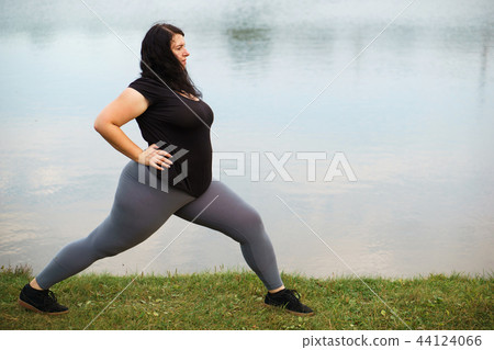 Woman training legs getting ready for run Woman training legs getting ready for run 44124066