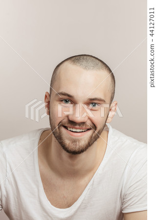 pleasant man is laughing at funny stories 44127011