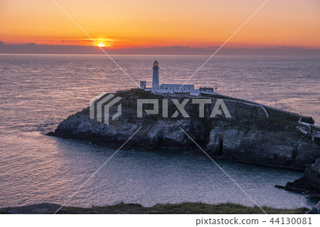 Sunset at south stack lighthouse on Anglesey in Wales 44130081