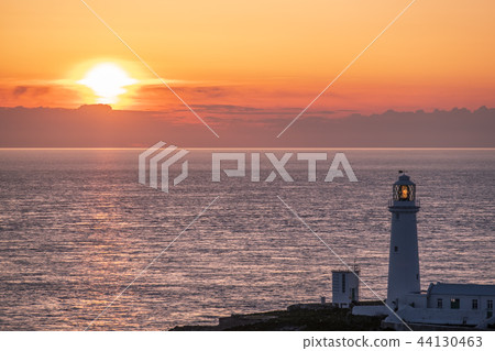 Sunset at south stack lighthouse on Anglesey in Wales Sunset at south stack lighthouse on Anglesey in Wales 44130463