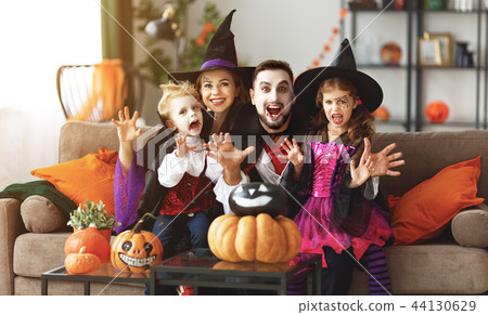 happy family mother father and children in costumes and makeup o happy family mother father and children in costumes and makeup o 44130629
