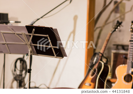 Music stand and guitar Music stand and guitar 44131848